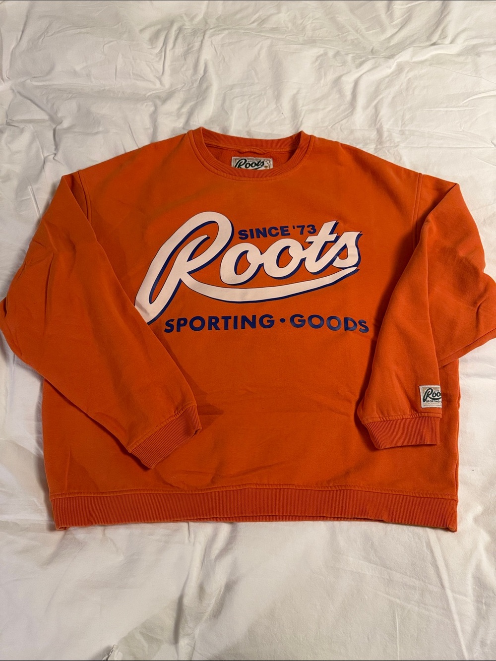 Roots Sporting Goods 50th Anniversary Gender Free Orange Crewneck Sweatshirt